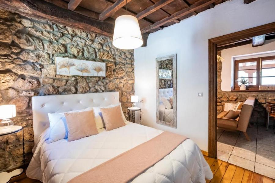 dormitorio en apartamento rural en la laguna de somiedo